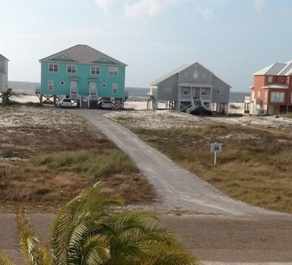 View of Gulf from porch; the perfect place to sit &amp; rock, see and hear the waves