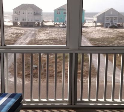 View of Gulf from 2nd story screened-in balcony; relax, enjoy the view &amp; sounds
