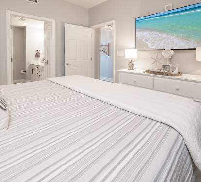 Relax after a beach day in your king master suite