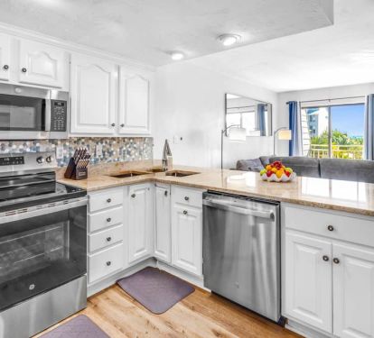 Living room to kitchen&mdash;pool sparkle and ocean views steal the show. Breathe it all in.