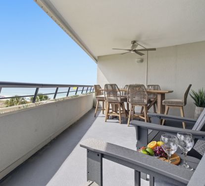 Enjoy the spacious balcony with seating and dining