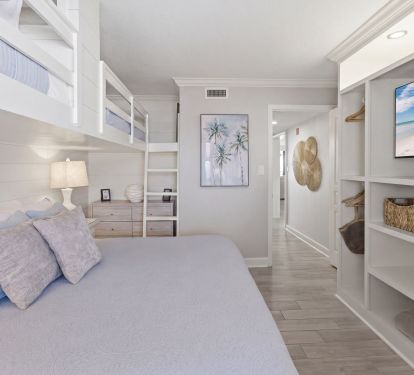 Guest bedroom with built in entertainment center