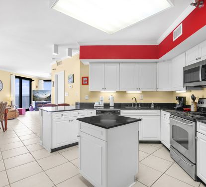 Open kitchen space with kitchen island seating space
