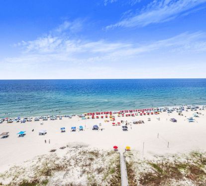 Sandy beach with bright blue skyline