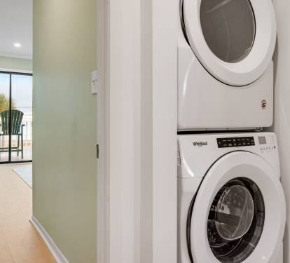 Full size laundry set on second floor.