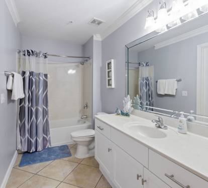Guest bedroom ensuite with additional hallway access