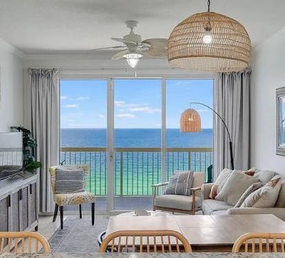 Spacious living room with stunning turquoise Gulf views-relax in coastal comfort