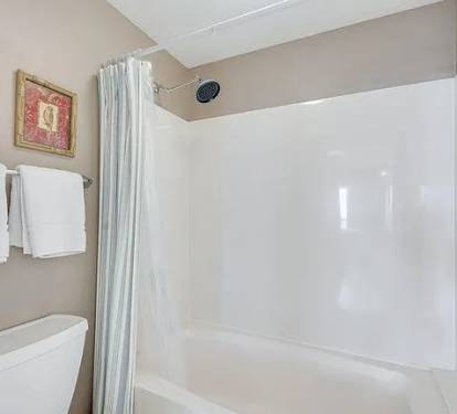Master bathroom with rain showerhead&mdash;modern, spotless, and perfect for relaxing