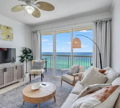 Living room with Smart TV and beach views&mdash;relax in comfort with stunning scenery