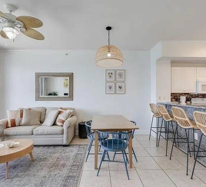 Dining area with coastal charm&mdash;gather, relax, and enjoy bright openâ€‘concept living