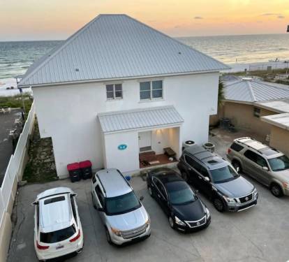 Beachfront parking for 6+ cars &mdash; steps from the sand and sunset views!