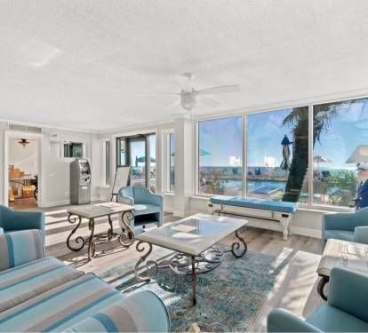 Common area/social room overlooking the pools and Gulf