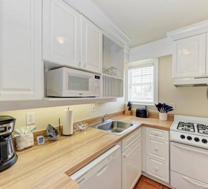 Full kitchen stove, microwave, coffee maker 