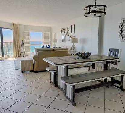Beautiful dinner table with view of the Gulf. Its a large open space. 