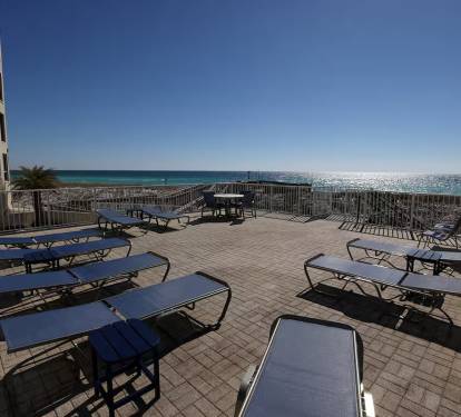 Relax on top of pool deck looking at the Gulf.