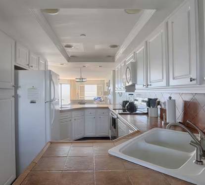 Kitchen has view of Gulf