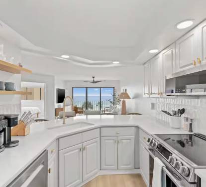 Fully equipped kitchen with modern appliances, perfect for home cooking.
