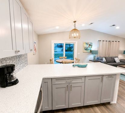 Open floor kitchen, dining area and living room 