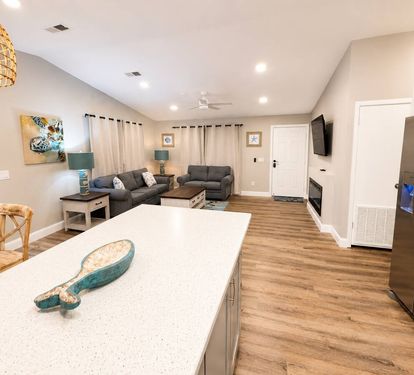 Open floor kitchen, dining area and living room 