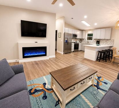 Open floor kitchen, dining area and living room 