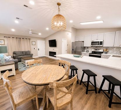 Open floor kitchen, dining area and living room 