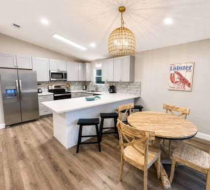 Open floor kitchen, dining area and living room 
