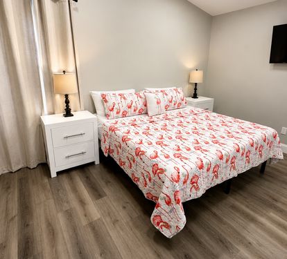 Main bedroom King bed with bathroom and a walk-in shower 