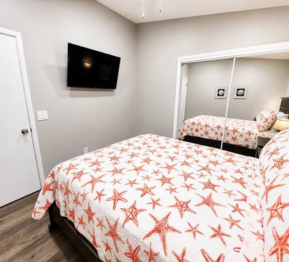 First bedroom is a queen bed and a Roku TV