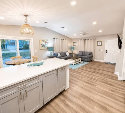 Open floor kitchen, dining area and living room 