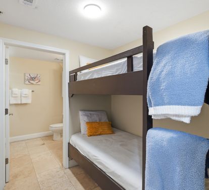 Bunk area with full bath