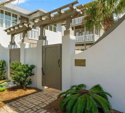 Walk under the pergola into your private outdoor escape