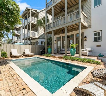 Raised 30A cottage with a private pool out front