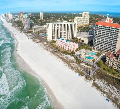 Enjoy sugar-white sand &amp; emerald waters&mdash;we provide chairs, umbrella &amp; more