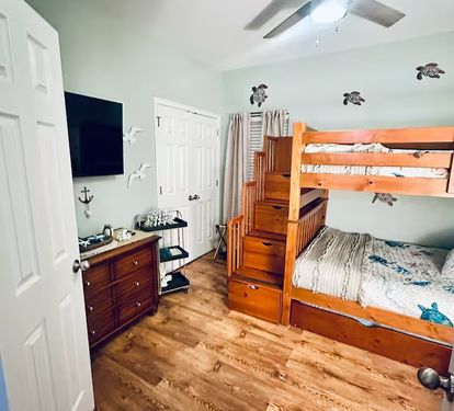 Room 3 Full Bunk and Twin Trundle, Dresser, Storage, 55" TV, sitting chair