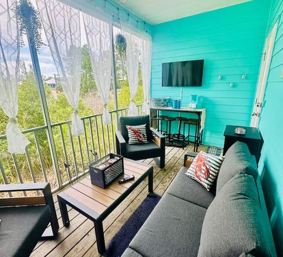Patio- Sofa, 2 sitting chairs, coffee table, 50" Smart TV, Bar, Ice bucket