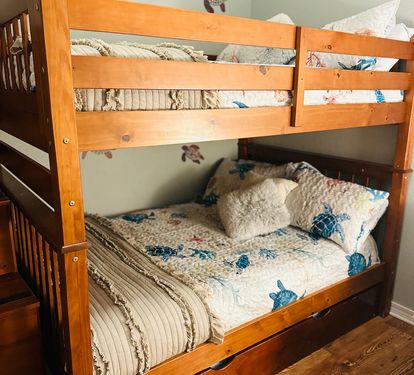 Room 3 Full Bunks and Twin Trundle. Linens, Ceiling Fan, Sitting Chair, Charger