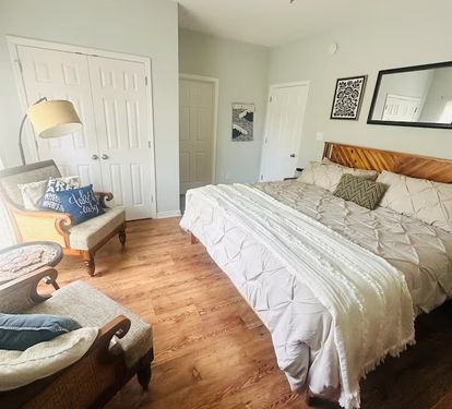 King Bedroom 2- Rollaway, Ceiling Fan, Closet, Dresser, access to bathroom 1.