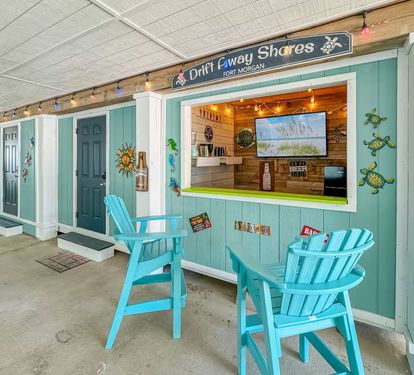 Hang out for hours of fun and relaxation by the covered Tiki Bar