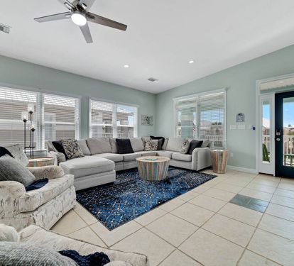 Lots of comfy seating for relaxing and watching a movie with loved ones