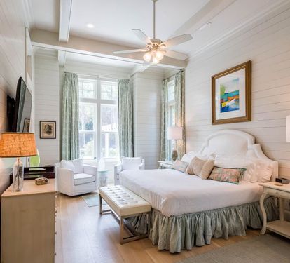 Main floor master overlooks the pool, features large walk in and en suite
