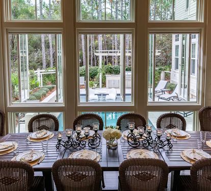 Table for 12 overlooking pool and patio.