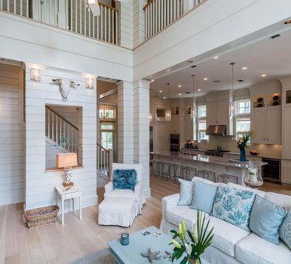 Second floor balcony overlooks family room.