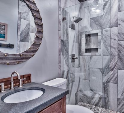 Hall shared bathroom with a walk-in shower