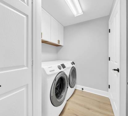 Full-size washer and dryer make it easy to keep up with laundry during your stay, with a drying rack perfect for air-drying swimsuits and delicates. Upper cabinets provide extra storage and are stocked with games and puzzles for downtime and family fun.
