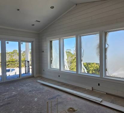 Living Room with Balcony & Bay Views, sleeper sofa, oversized chair, TV & streaming music.