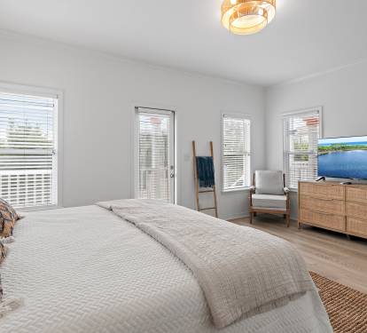 Primary Bedroom with King Bed and Smart TV