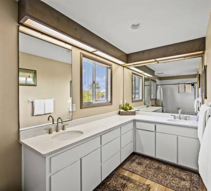 Experience ultimate relaxation with fresh and clean bath towels, perfect for enjoying a soothing soak in the tub.