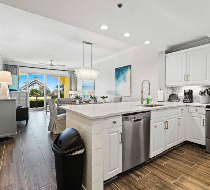 Open & Functional Layout - Enjoy easy vacation living with this kitchen-dining combo.