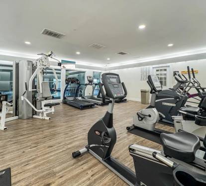 SH Gym looking from the far corner back at the Indoor pool and equipment.  