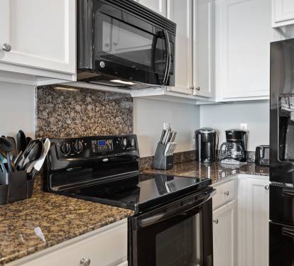The kitchen is well-equipped with everything you need, including a Keurig and regular coffee pot.